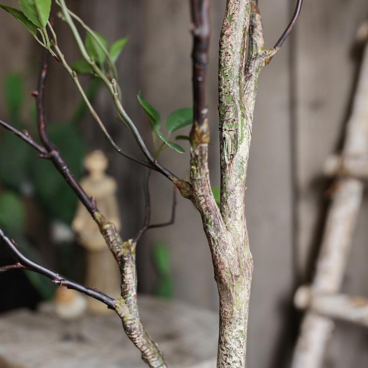 Artificial Green Leaf Faux Tree in a stylish black pot, showcasing realistic green leaves and a lifelike appearance.