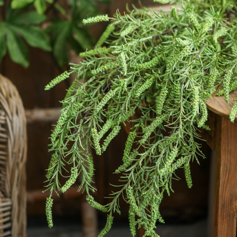 A 49-inch tall artificial rosemary stem with vibrant green leaves, perfect for home decor.