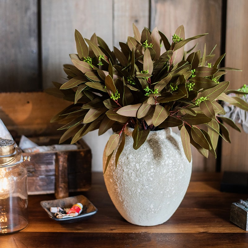 18-inch tall artificial eucalyptus stem bundle in brown, featuring realistic sun-dried leaves, perfect for home decor.