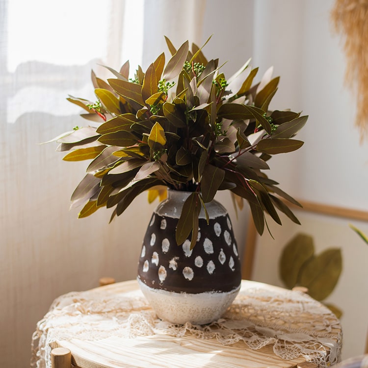 18-inch tall artificial eucalyptus stem bundle in brown, featuring realistic sun-dried leaves, perfect for home decor.