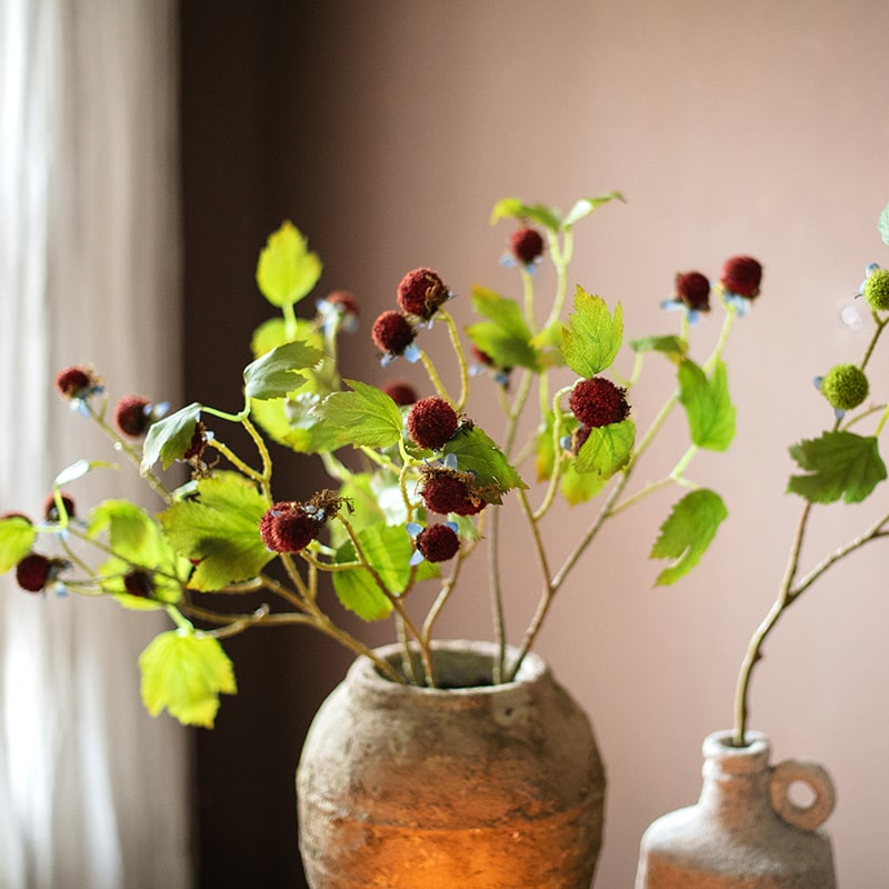 27-inch tall artificial plane plant fruit stem with vibrant green and red colors, designed for home and office decor.