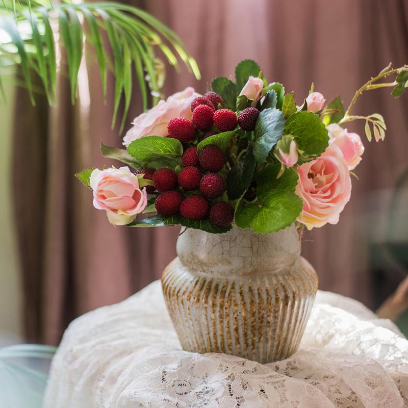 A beautiful 7-inch tall artificial silk raspberry rose bouquet featuring pink roses and raspberry accents, perfect for romantic decor.