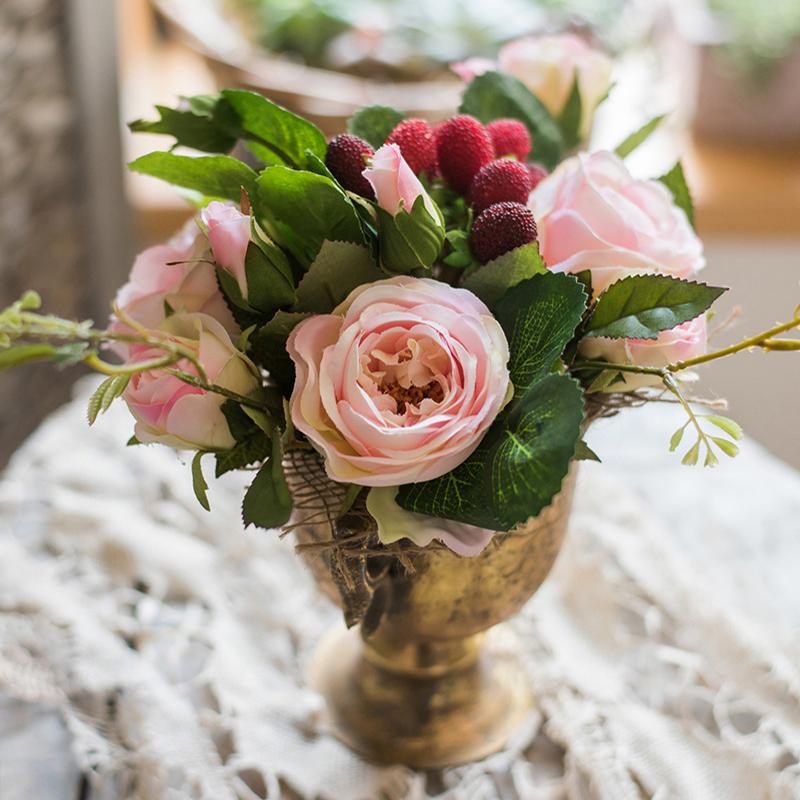 A beautiful 7-inch tall artificial silk raspberry rose bouquet featuring pink roses and raspberry accents, perfect for romantic decor.