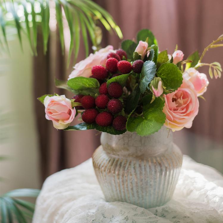 A beautiful 7-inch tall artificial silk raspberry rose bouquet featuring pink roses and raspberry accents, perfect for romantic decor.