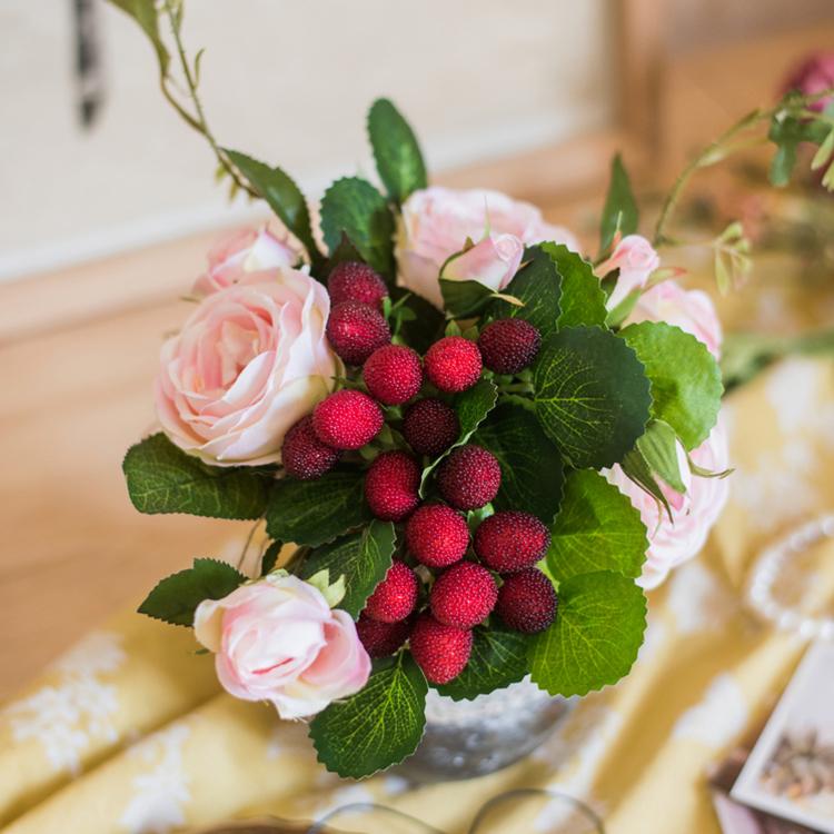 A beautiful 7-inch tall artificial silk raspberry rose bouquet featuring pink roses and raspberry accents, perfect for romantic decor.