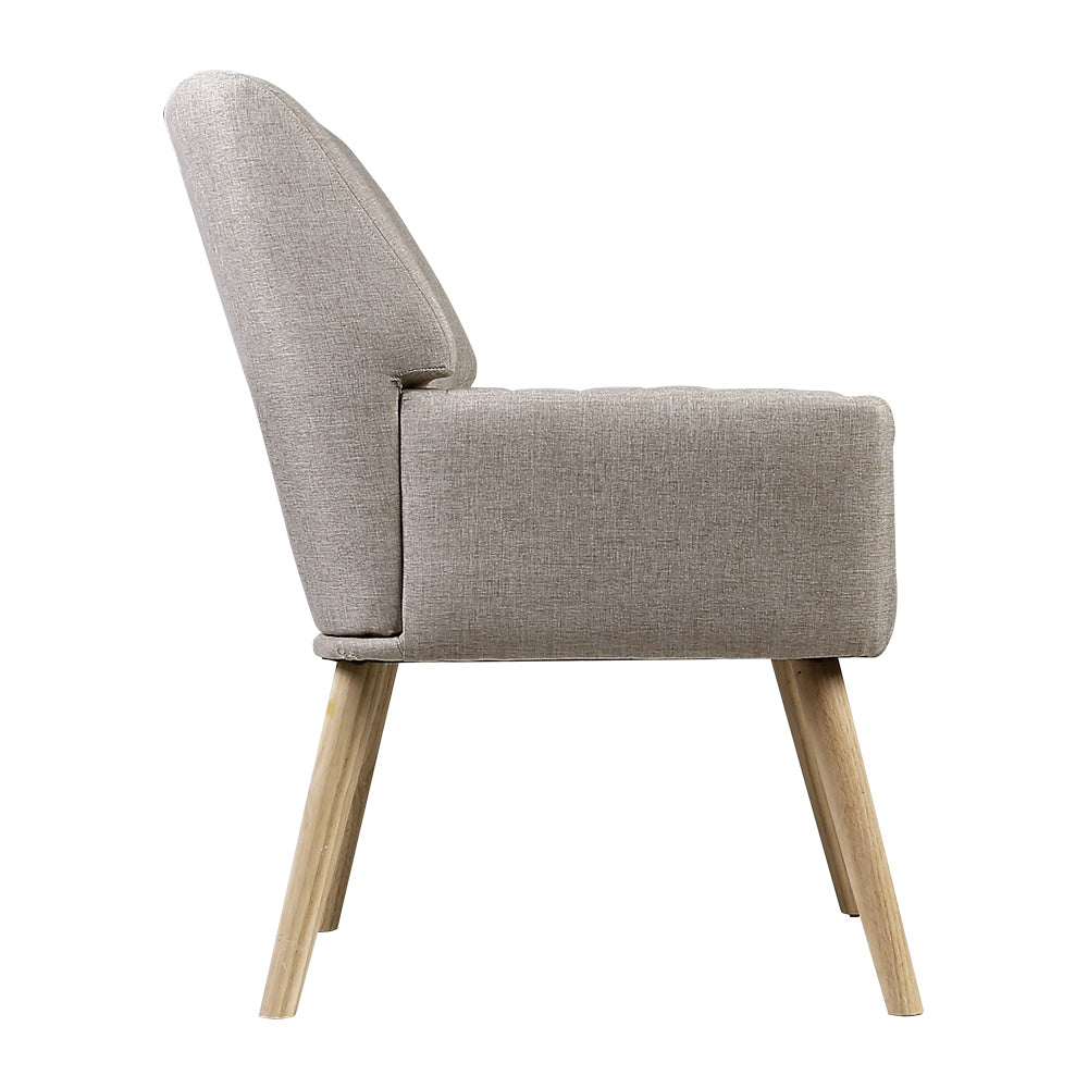 Artiss Sebastini Armchair in beige faux fabric with rubber wood legs, showcasing its elegant design and plush seating.
