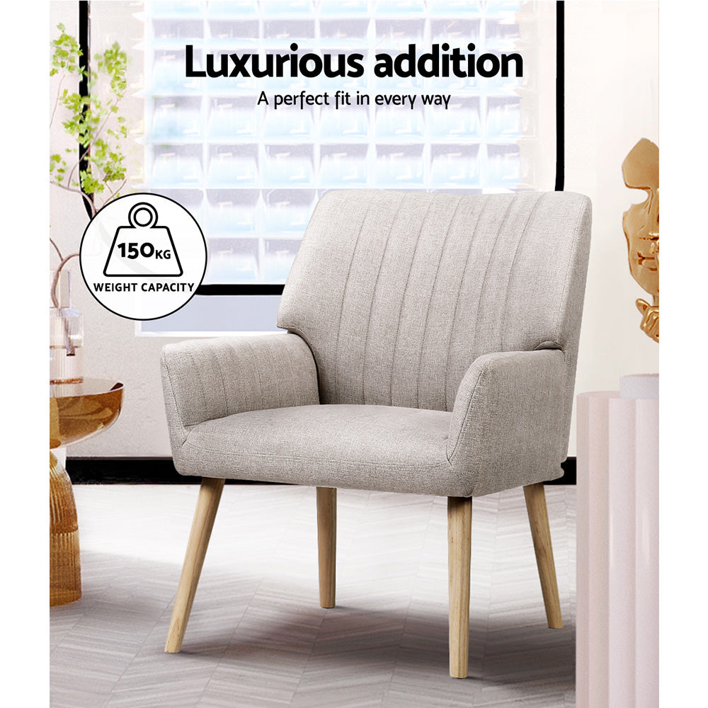 Artiss Sebastini Armchair in beige faux fabric with rubber wood legs, showcasing its elegant design and plush seating.