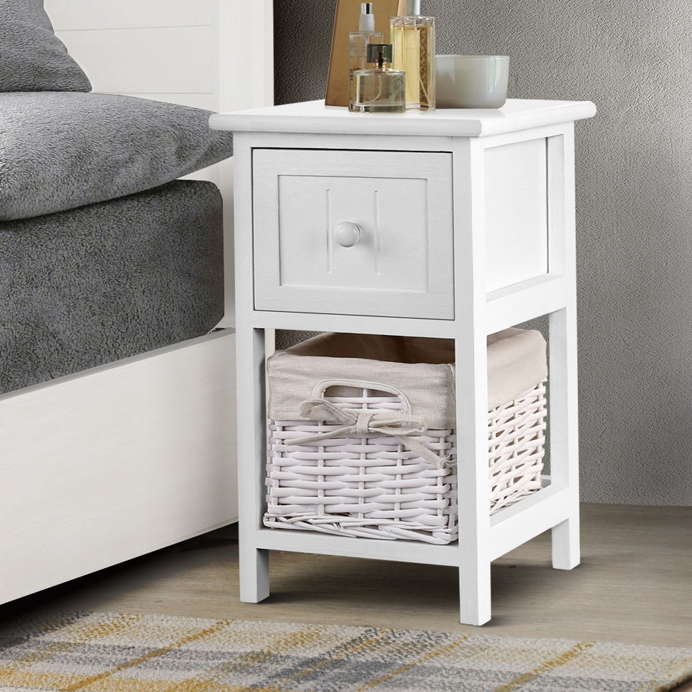 Artiss Bedside Table set featuring rustic white finish, one drawer, and a wicker basket for storage, ideal for cottage-style decor.