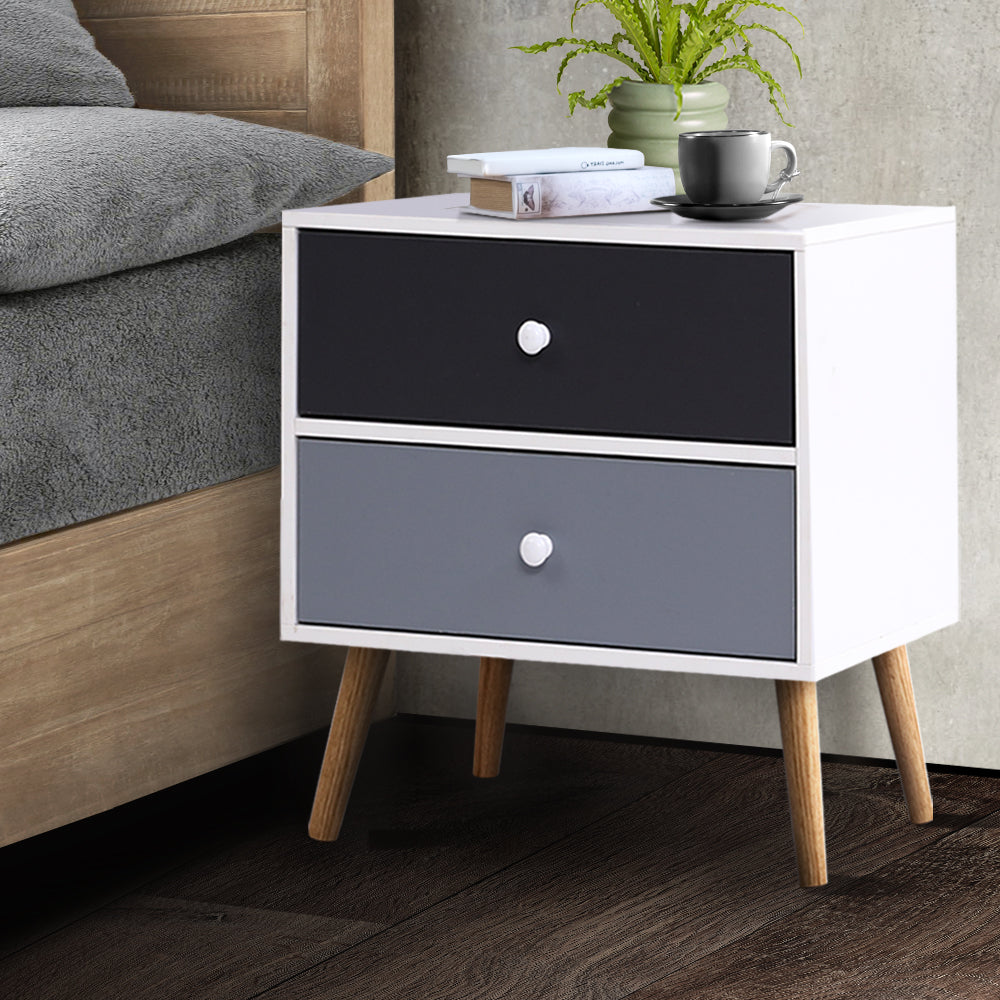 Artiss Bedside Table featuring a Scandinavian-inspired design with two drawers, solid wood legs, and a chic black and white finish.