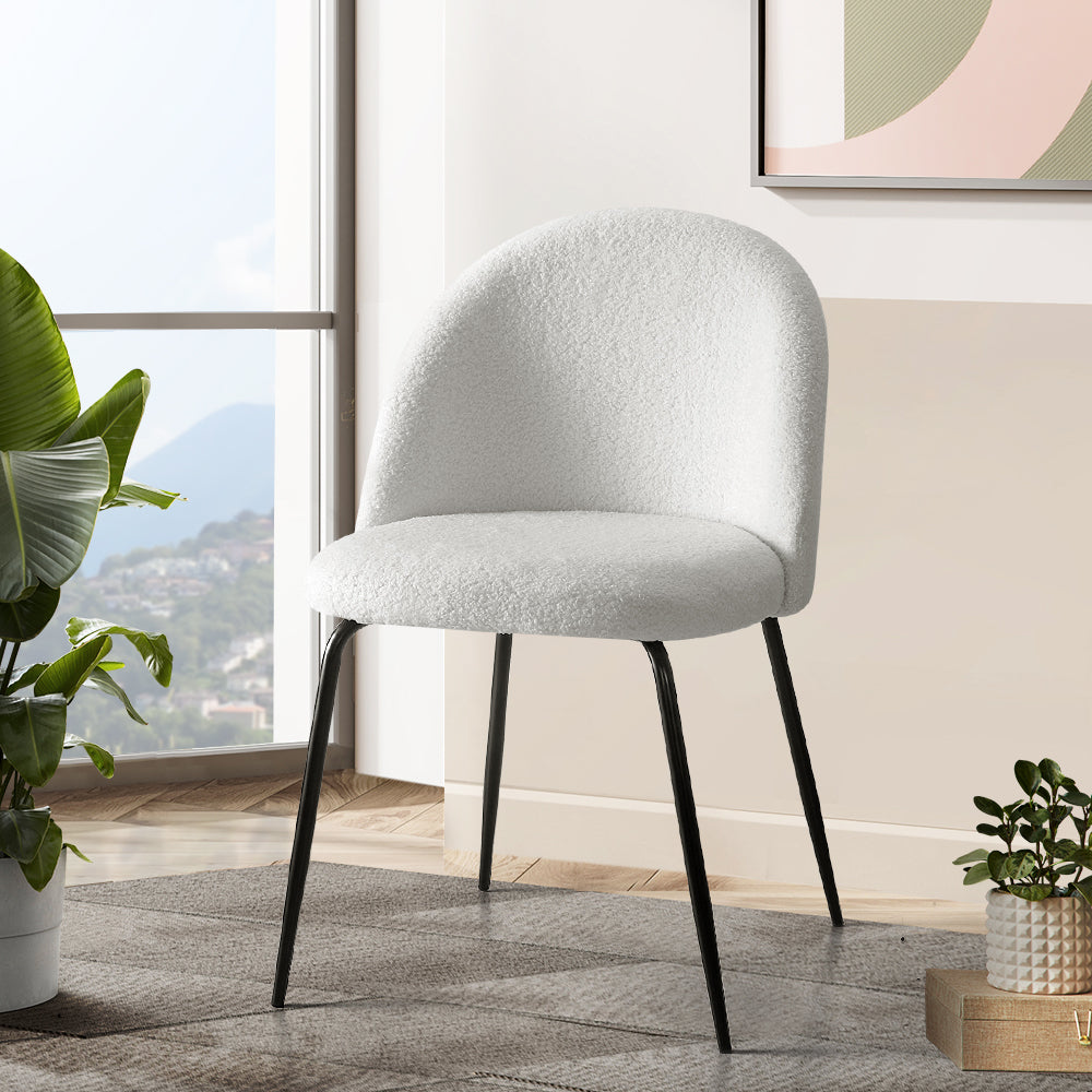 Artiss Dining Chairs featuring luxurious sherpa upholstery and sturdy steel legs, perfect for dining and accent seating.