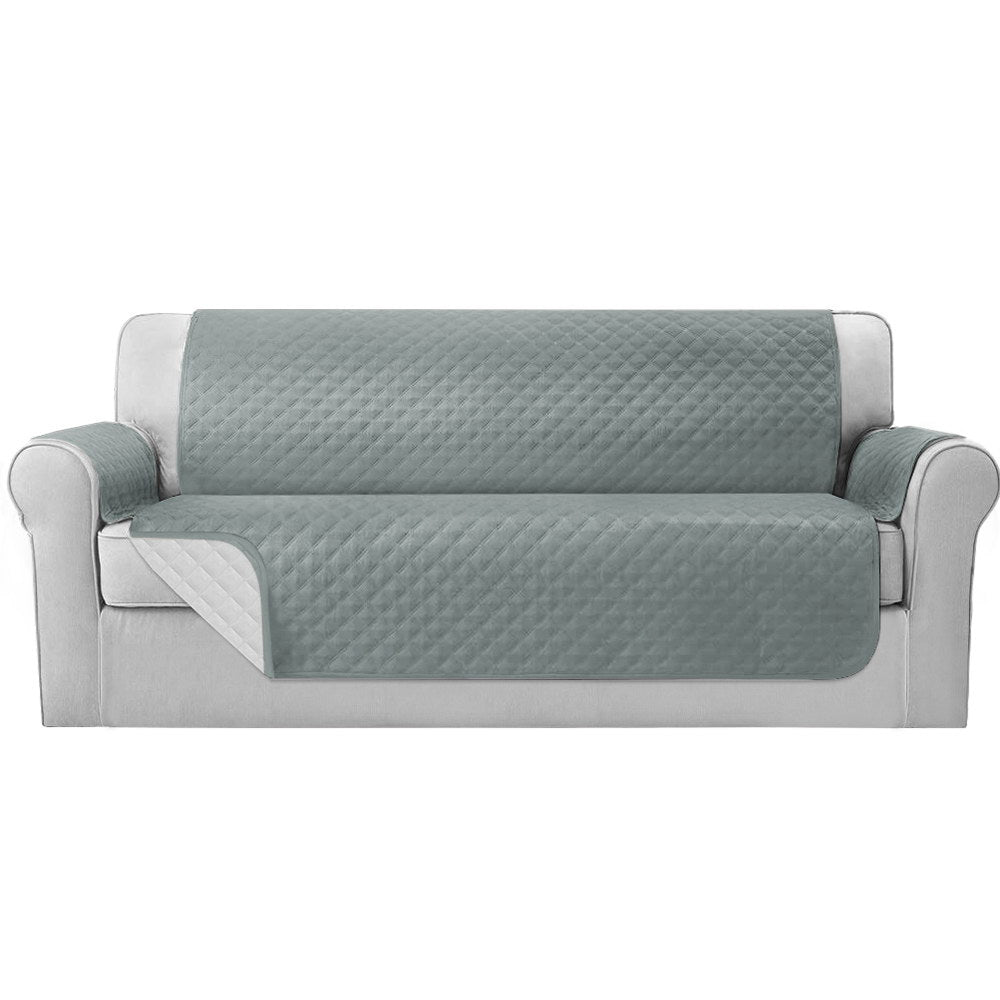 Artiss 4 Seater Sofa Cover in grey, featuring a diamond-quilted design and water-resistant fabric, ideal for protecting furniture.