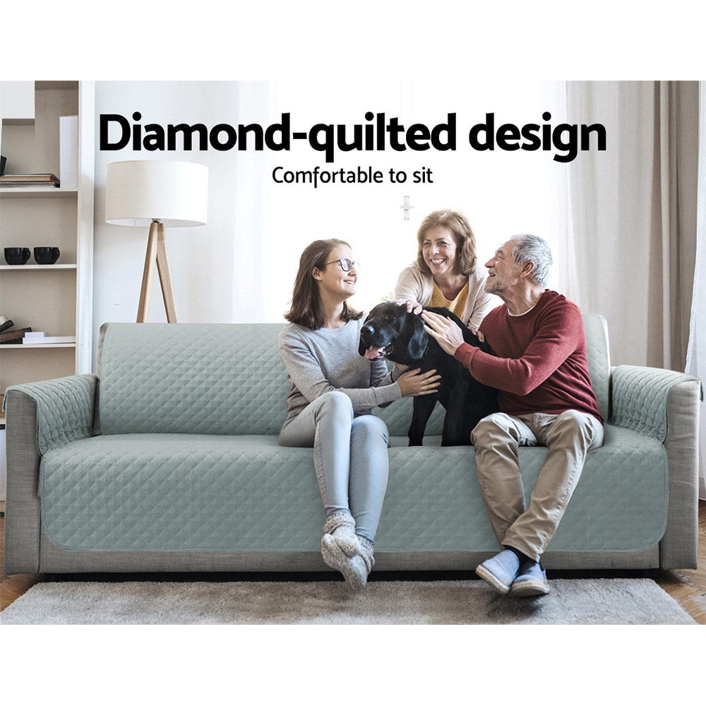 Artiss 4 Seater Sofa Cover in grey, featuring a diamond-quilted design and water-resistant fabric, ideal for protecting furniture.