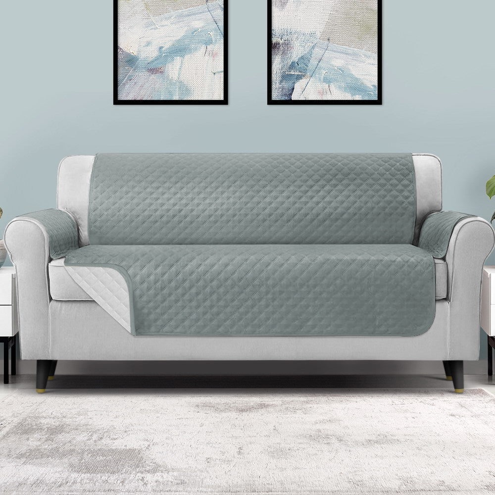 Artiss 4 Seater Sofa Cover in grey, featuring a diamond-quilted design and water-resistant fabric, ideal for protecting furniture.