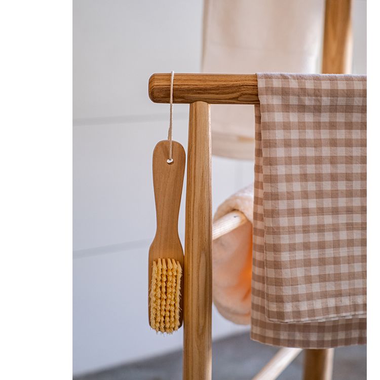 Freestanding Ash Wood Bath Towel Rack in natural color, showcasing unique wood grain and stylish design.