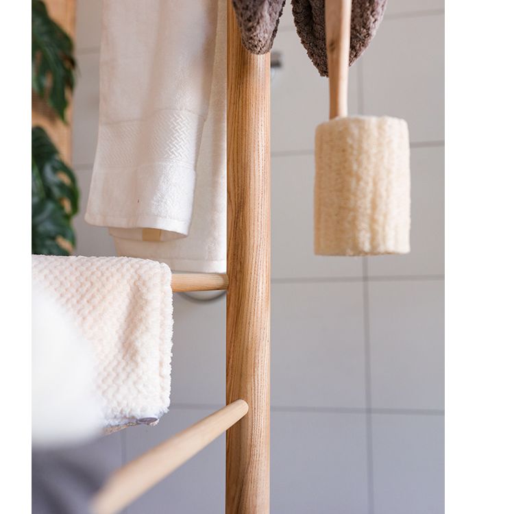 Freestanding Ash Wood Bath Towel Rack in natural color, showcasing unique wood grain and stylish design.