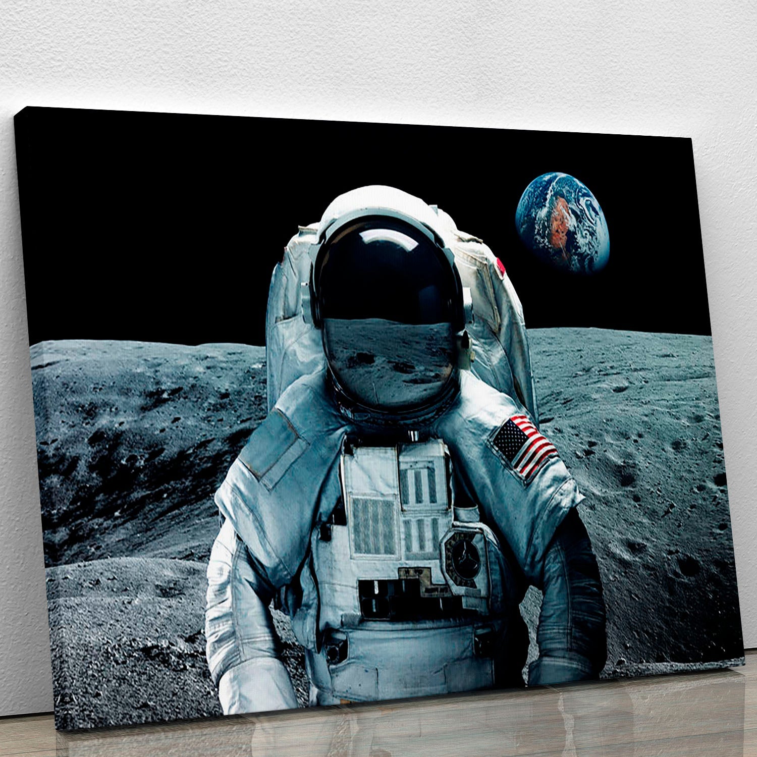 Canvas print of an astronaut standing on the moon, showcasing a stunning lunar landscape.