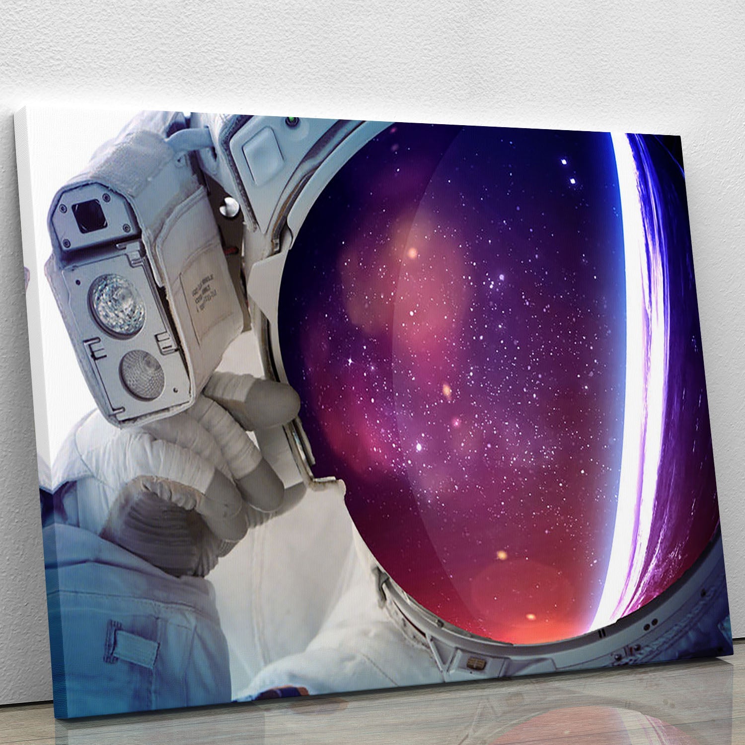 A vibrant Astronaut Canvas Print showcasing a detailed astronaut in space, surrounded by stars and planets, perfect for home or office decor.