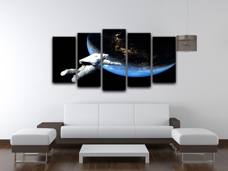 Astronaut floating in space with Earth in the background, displayed on a 5-split canvas artwork.