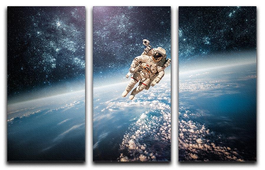 A stunning 3-panel canvas print featuring an astronaut in outer space with planet Earth in the background, showcasing vibrant colors and intricate details.