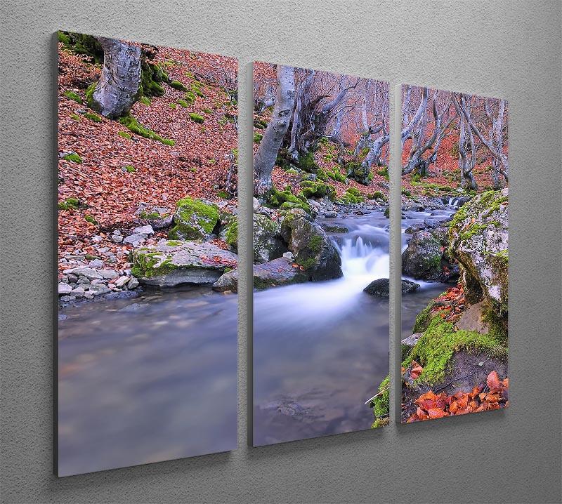 A beautiful 3-panel canvas print depicting an autumn landscape with a serene lake, showcasing vibrant fall colors.