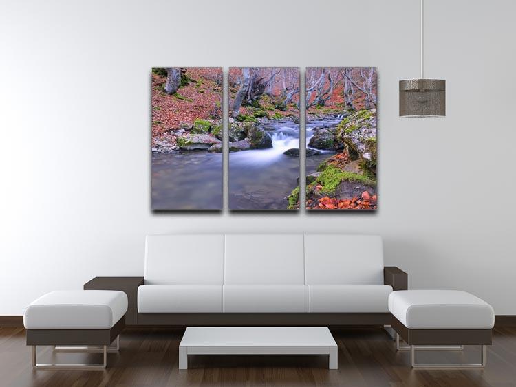 A beautiful 3-panel canvas print depicting an autumn landscape with a serene lake, showcasing vibrant fall colors.