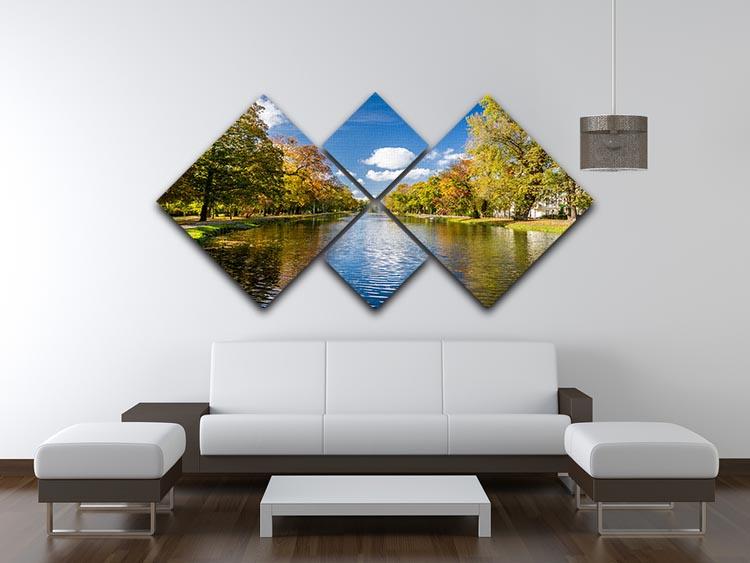 A beautiful 4-panel canvas artwork depicting an autumn park by the river, showcasing vibrant fall colors and serene nature.