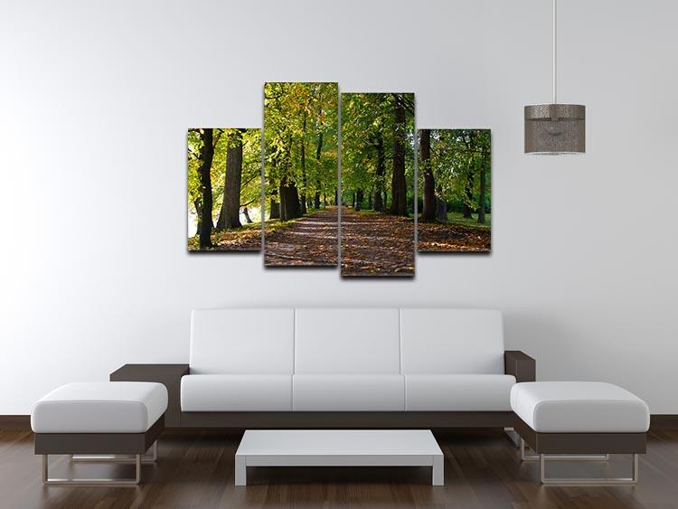 A beautiful 4-split canvas artwork depicting an autumn road lined with colorful leaves in a serene park setting.