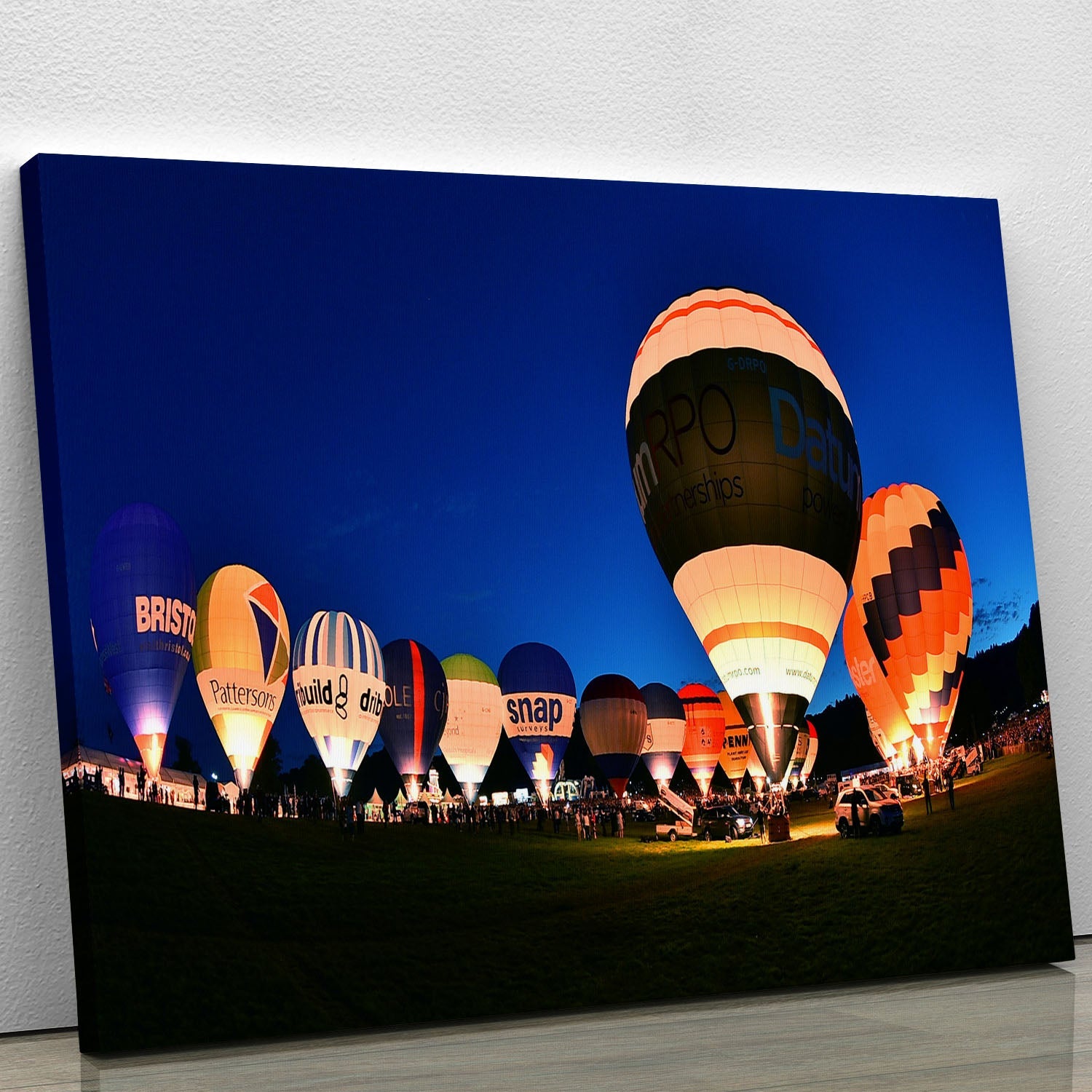 A beautiful canvas print or poster featuring colorful balloons floating in a night sky, adding elegance and charm to any decor.
