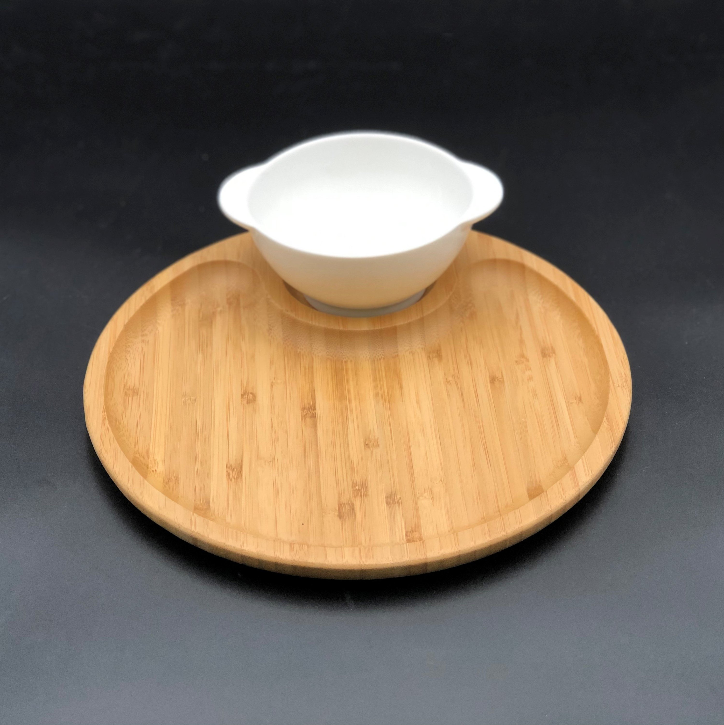 Bamboo and fine porcelain set featuring a soup cup and a bamboo tray, ideal for single servings of soup or cereal.