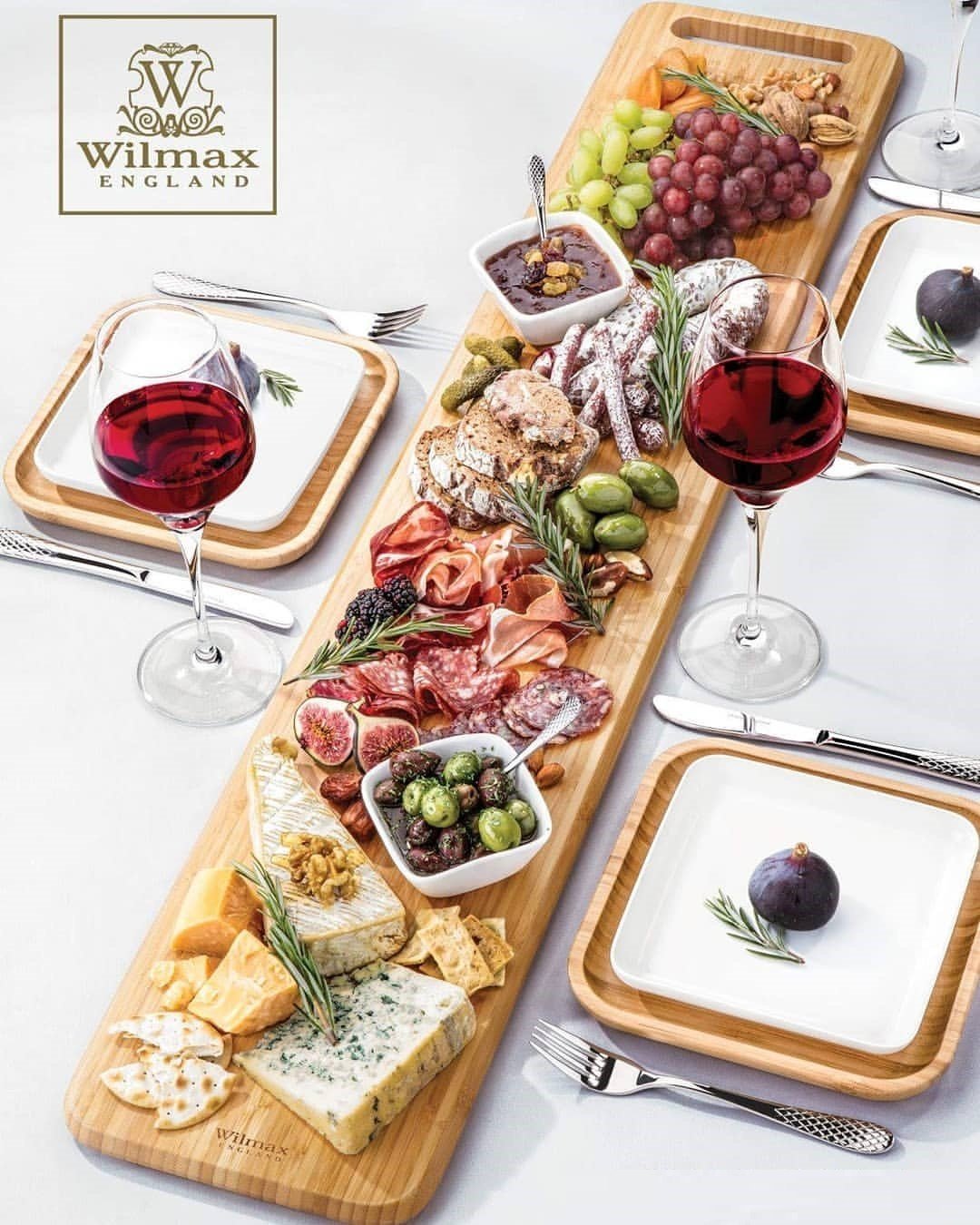 WILMAX Bamboo Charcuterie Board, 31.5 inches long, showcasing its elegant design and natural bamboo texture.