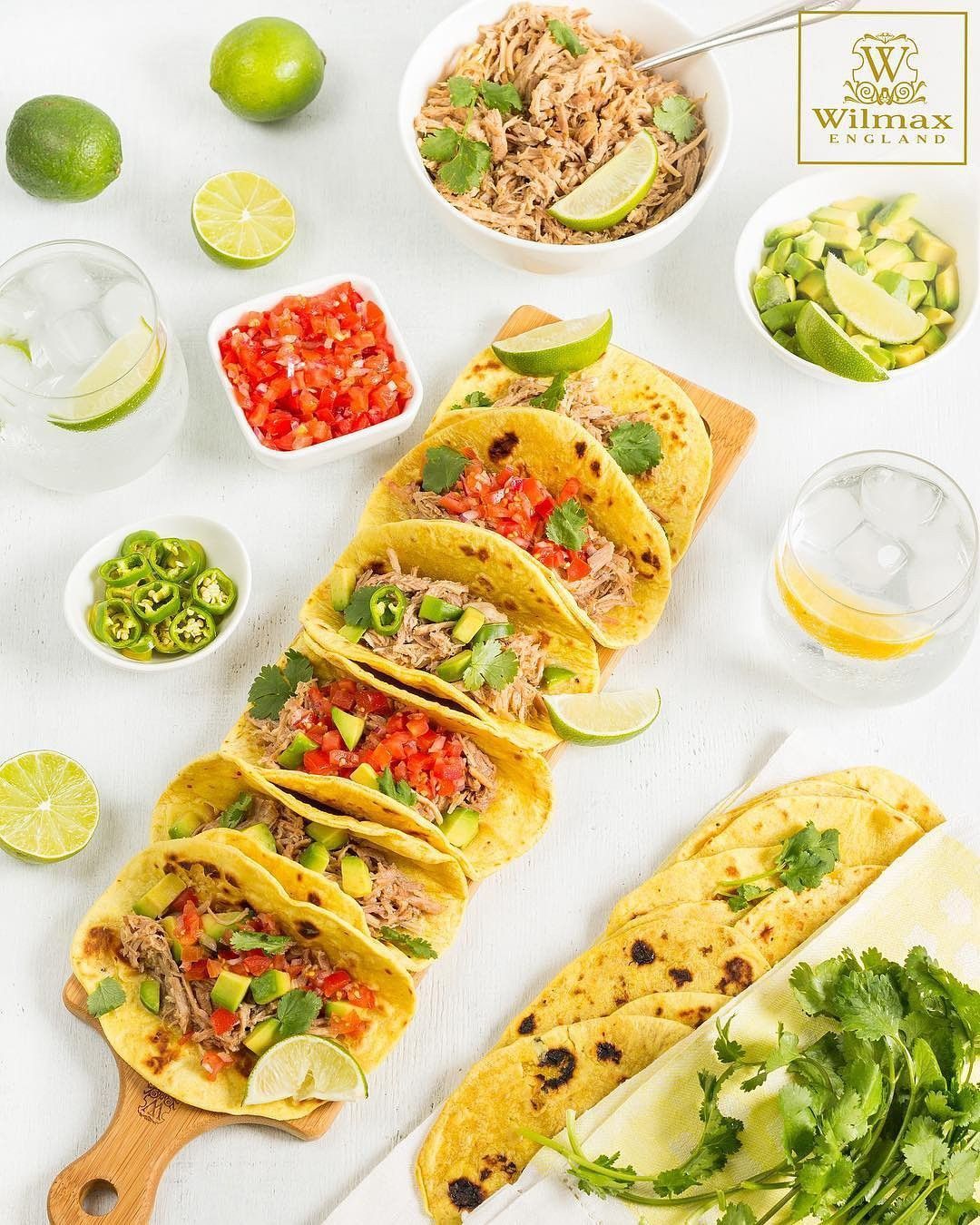 WILMAX Bamboo Long Serving Board with Handle, 26 inches by 5.9 inches, showcasing its elegant design and natural bamboo texture.