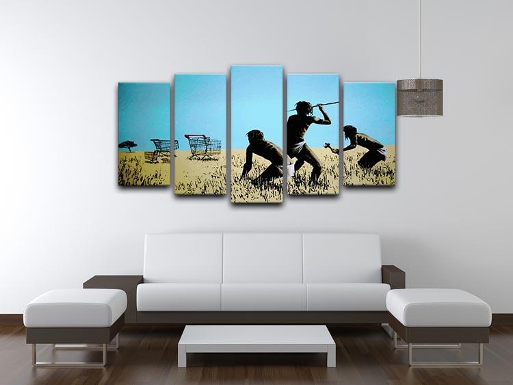Banksy Aborigine Hunters 5 Split Panel Canvas artwork featuring vibrant colors and dynamic design across five panels.