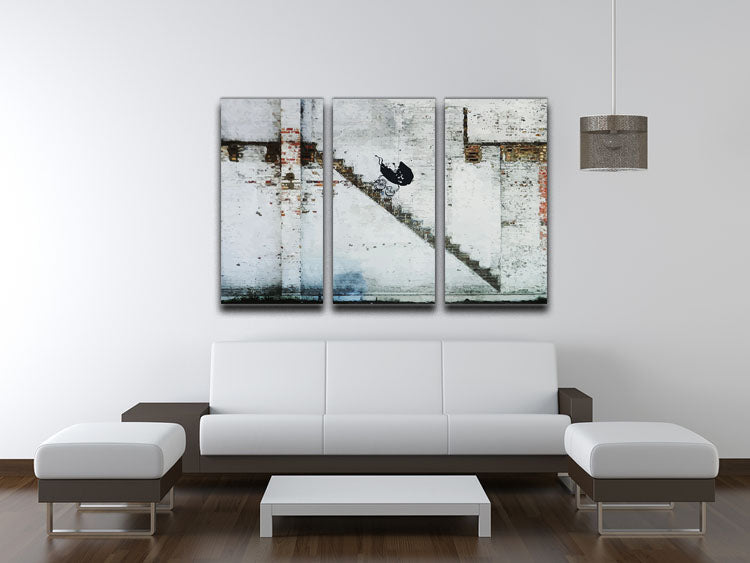 Banksy Baby Carriage 3 Split Panel Canvas Print showcasing three panels with a striking design, perfect for modern decor.
