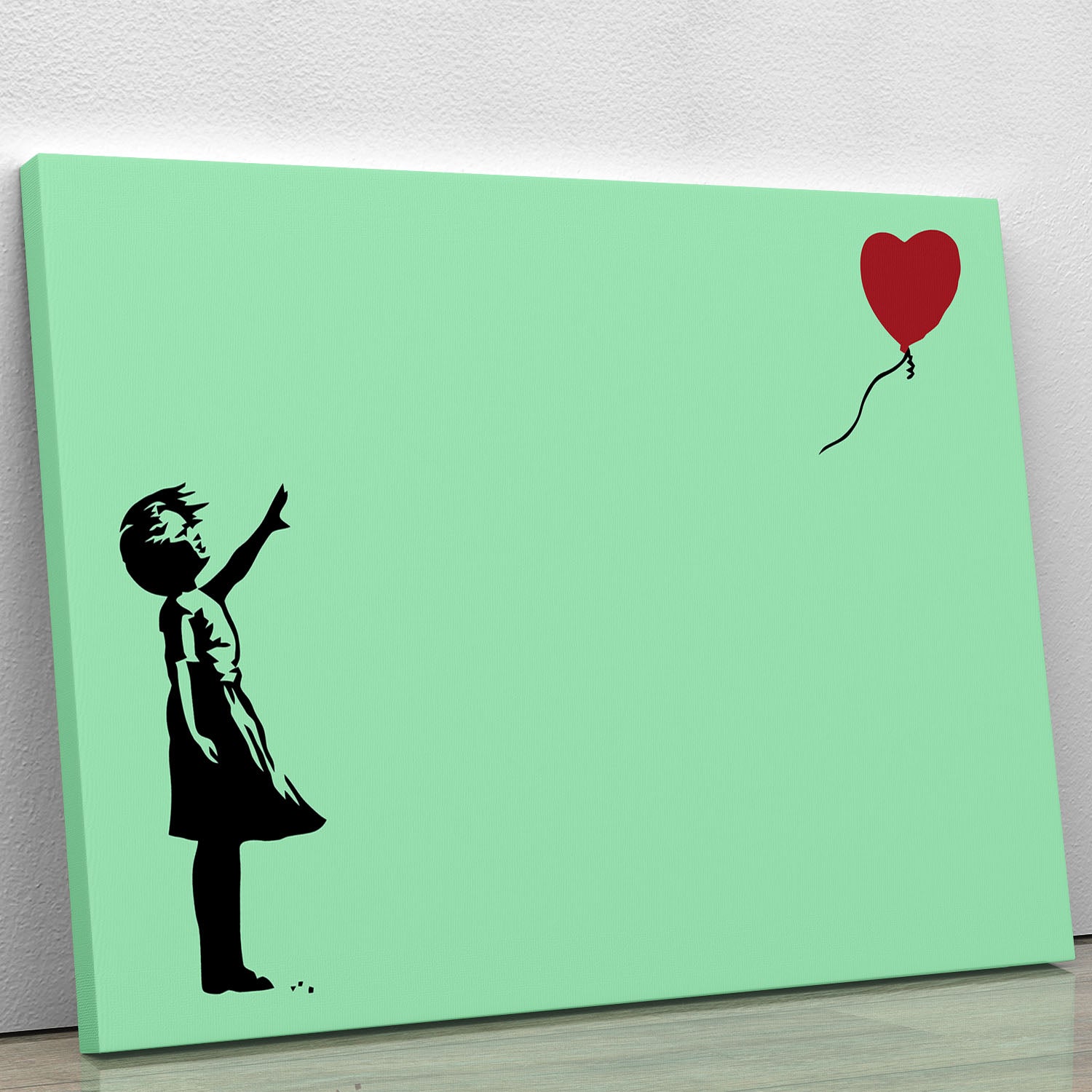 Banksy Balloon Heart Girl Green Canvas Print featuring a girl reaching for a heart-shaped balloon against a vibrant green background.