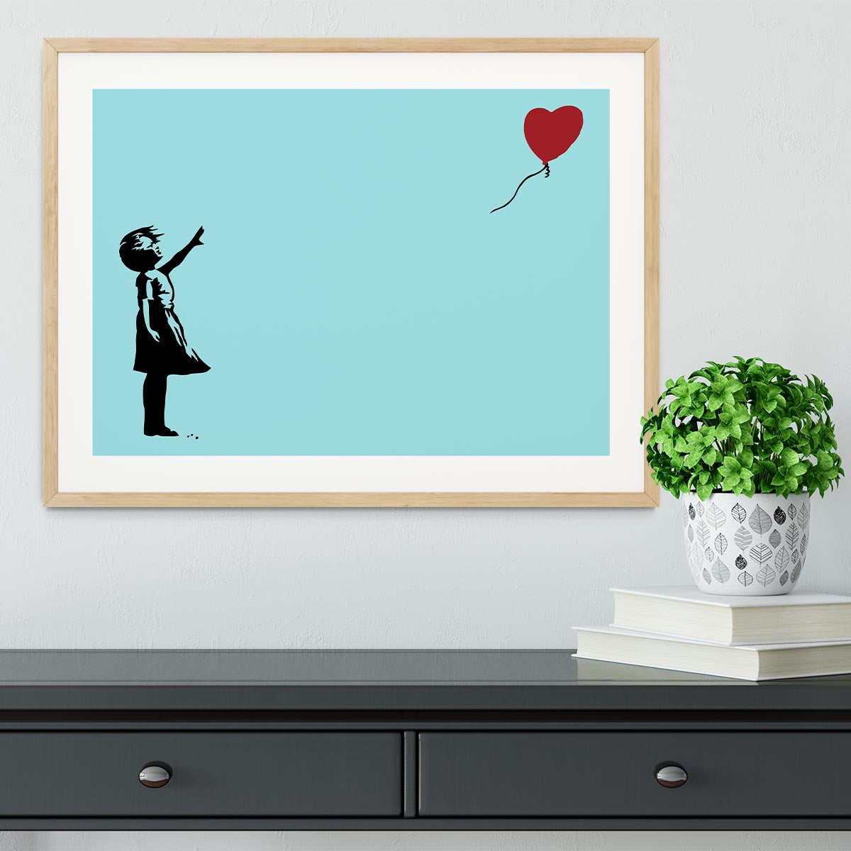 Banksy Balloon Heart Girl Light Blue Framed Print showcasing vibrant colors and a handmade frame.