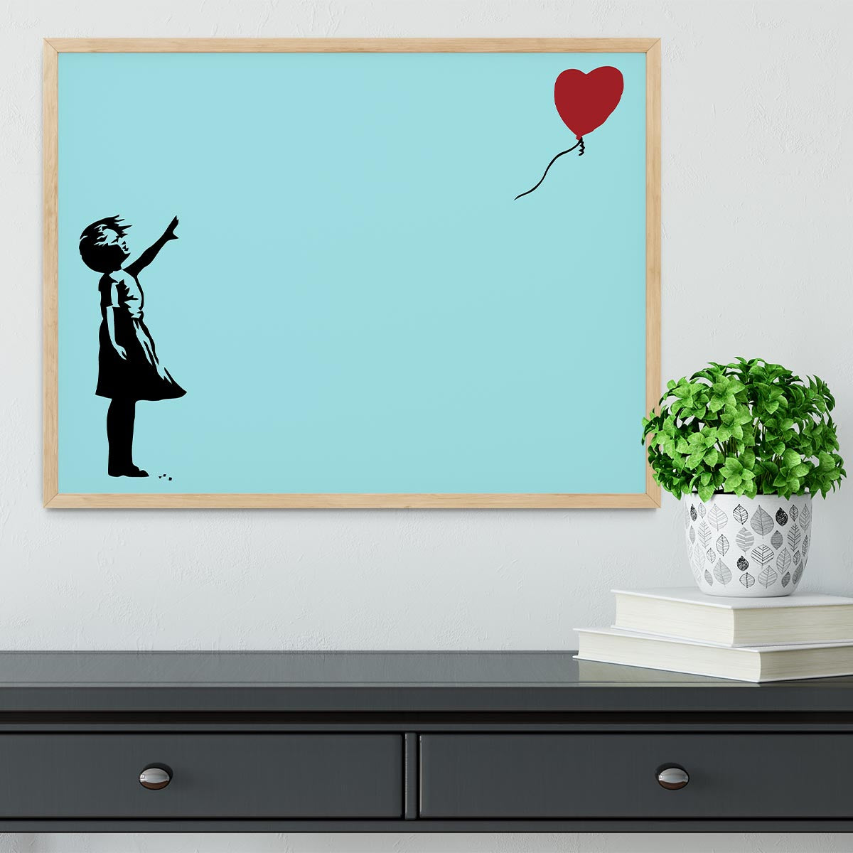 Banksy Balloon Heart Girl Light Blue Framed Print showcasing vibrant colors and a handmade frame.