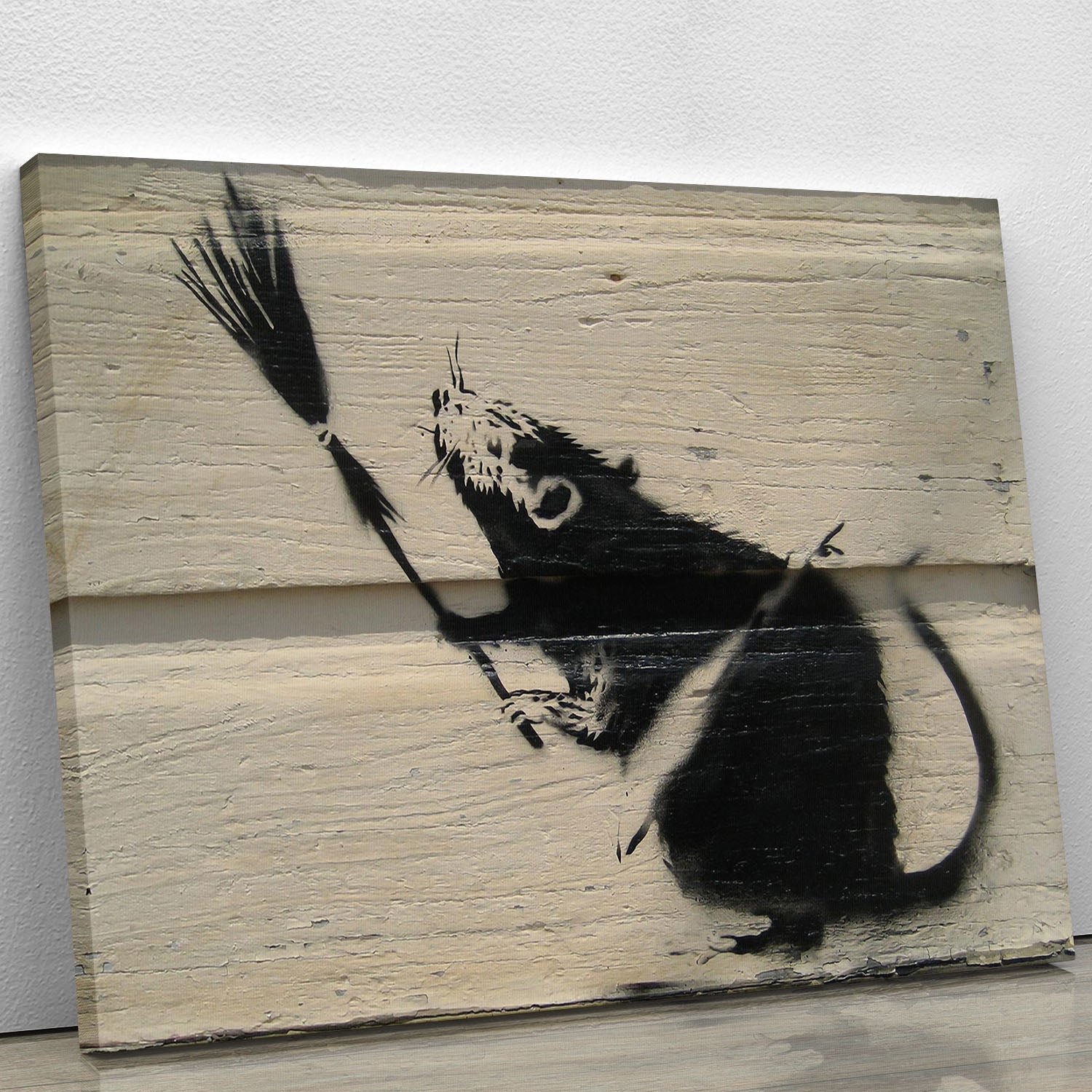 Banksy Broom Rat Canvas Print showcasing a rat holding a broom, vibrant colors and modern art style.