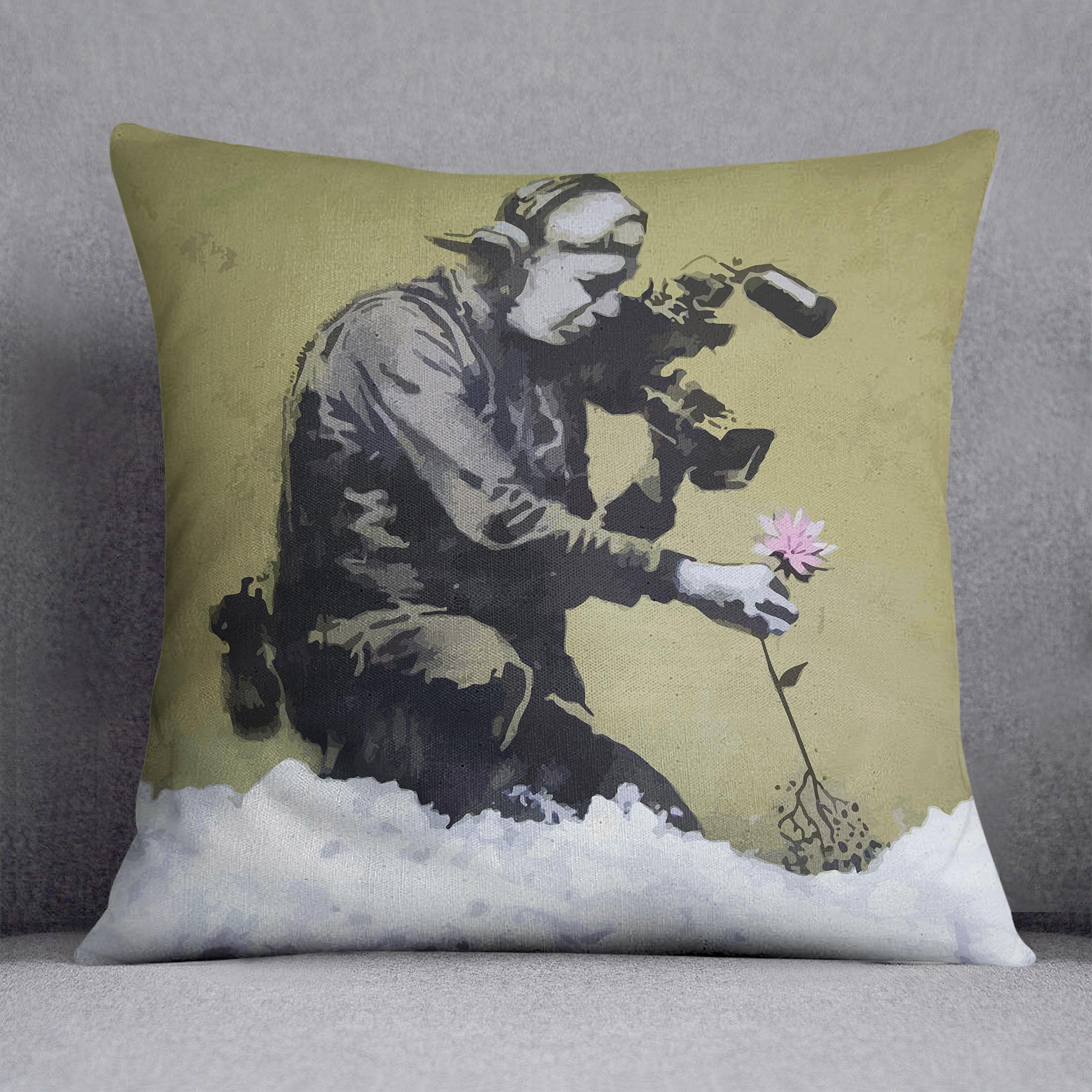 Banksy Cameraman and Flower Cushion featuring vibrant abstract design on luxurious vegan faux suede.
