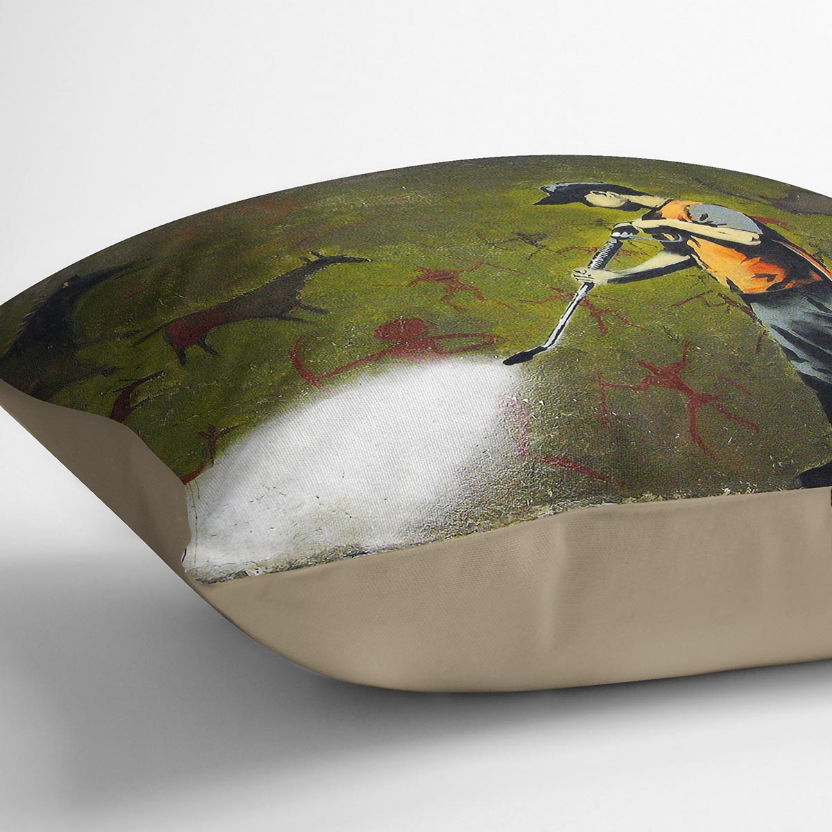 Banksy Cave Graffiti Removal Cushion featuring vibrant abstract designs on luxurious vegan faux suede.