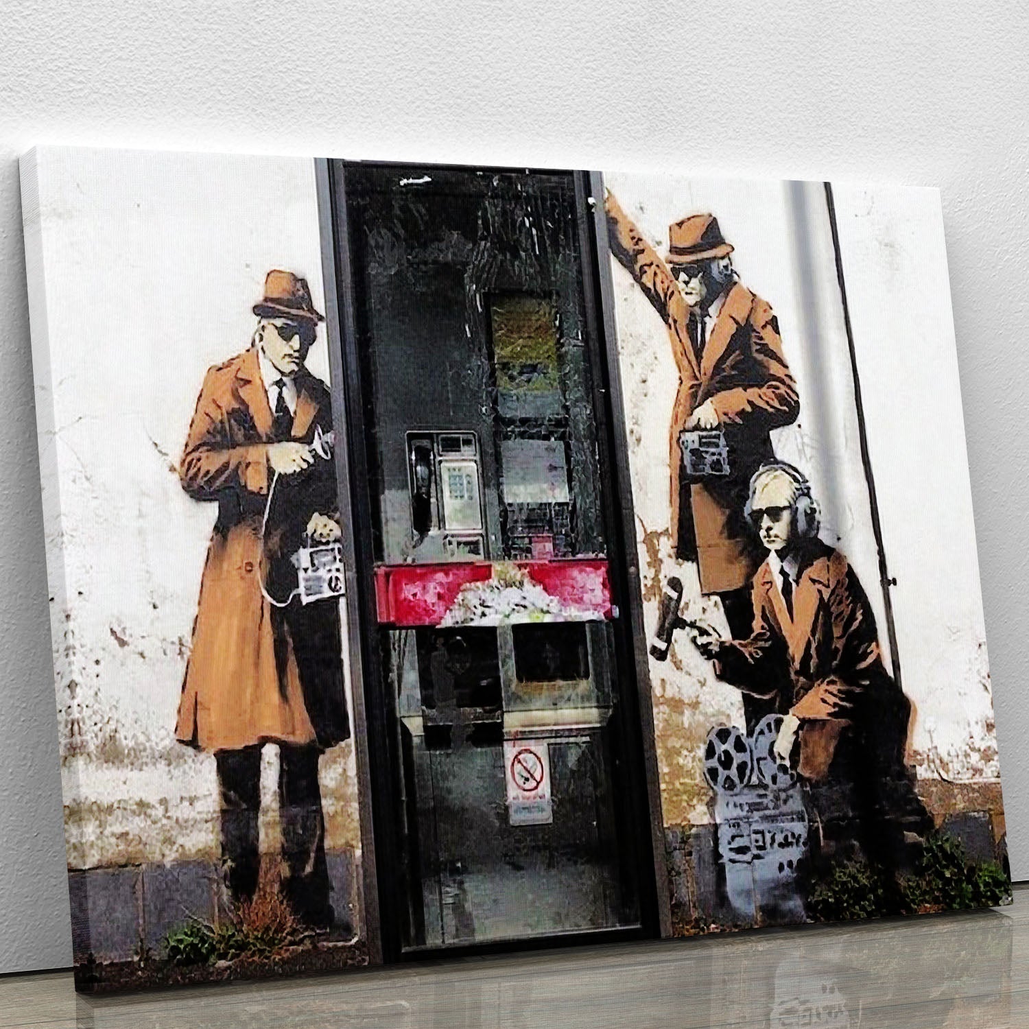 Banksy Cheltenham Telephone Box canvas print showcasing iconic street art in vibrant colors.