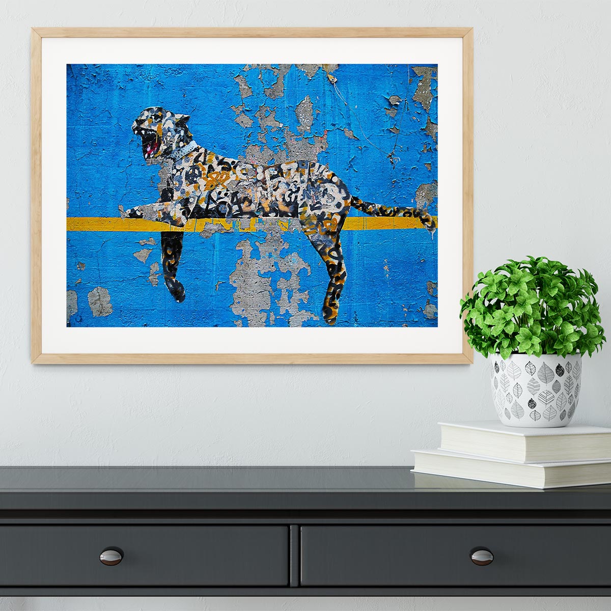 Banksy Cheetah Framed Print showcasing vibrant colors in a handmade frame, available in black, white, or natural wood.