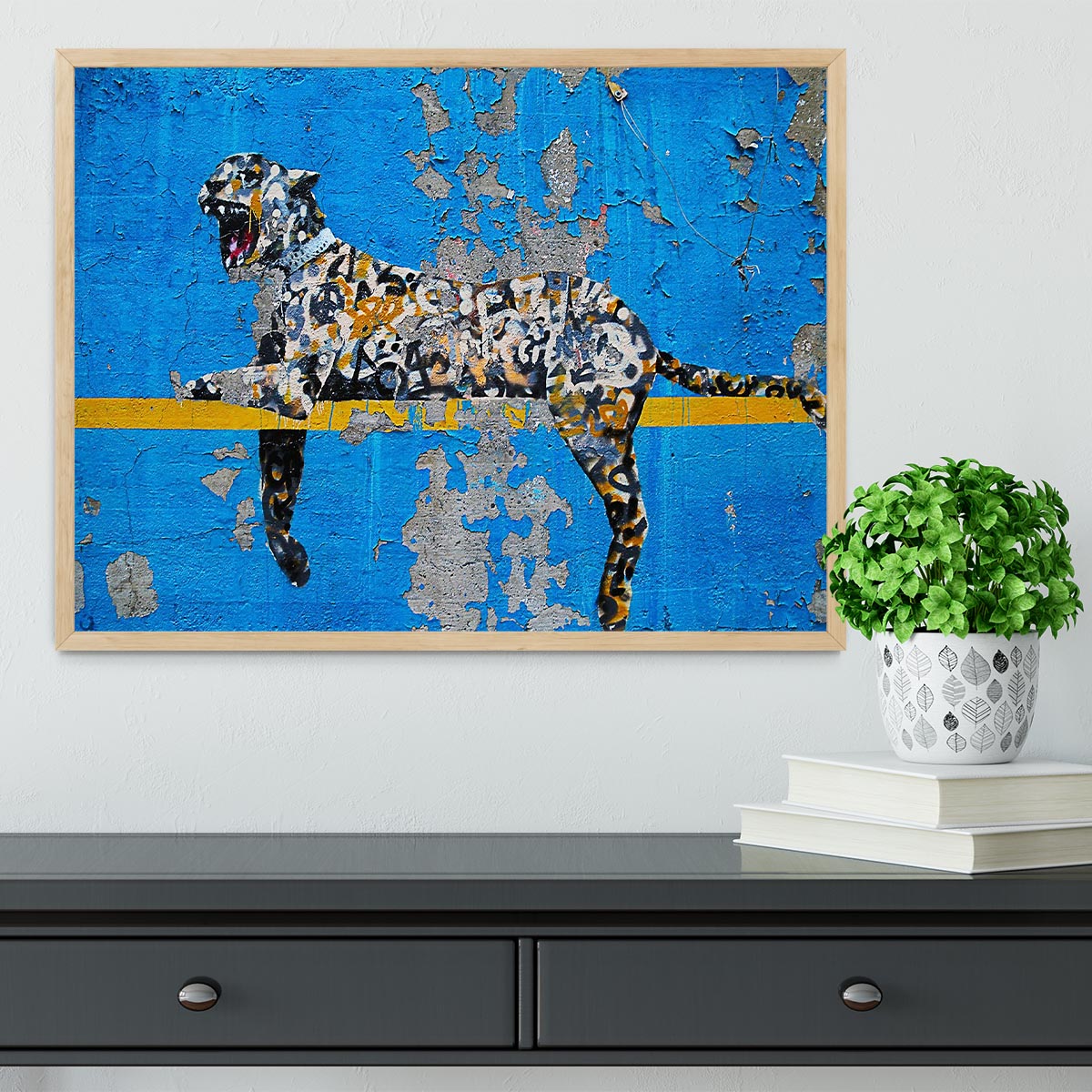 Banksy Cheetah Framed Print showcasing vibrant colors in a handmade frame, available in black, white, or natural wood.