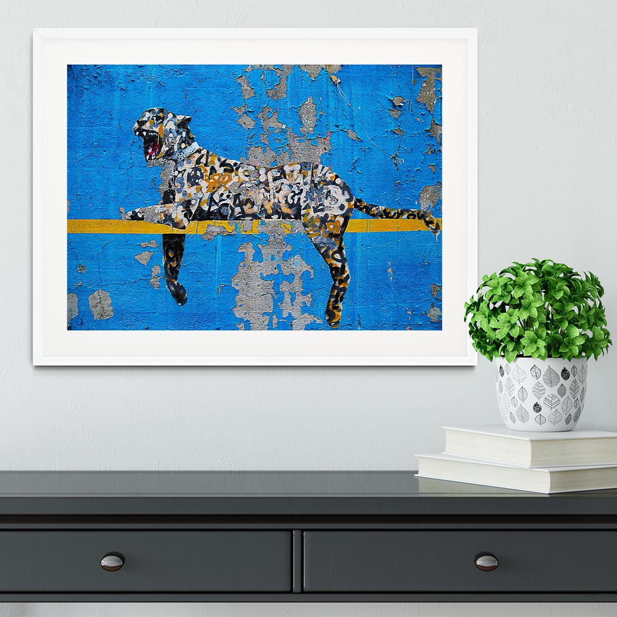 Banksy Cheetah Framed Print showcasing vibrant colors in a handmade frame, available in black, white, or natural wood.