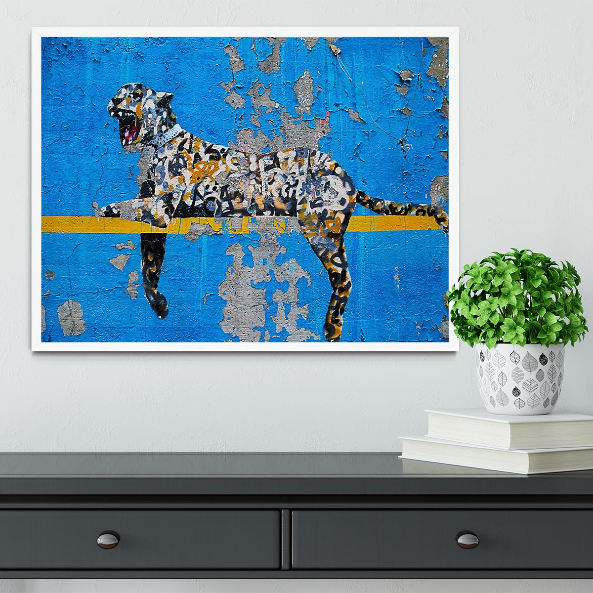 Banksy Cheetah Framed Print showcasing vibrant colors in a handmade frame, available in black, white, or natural wood.