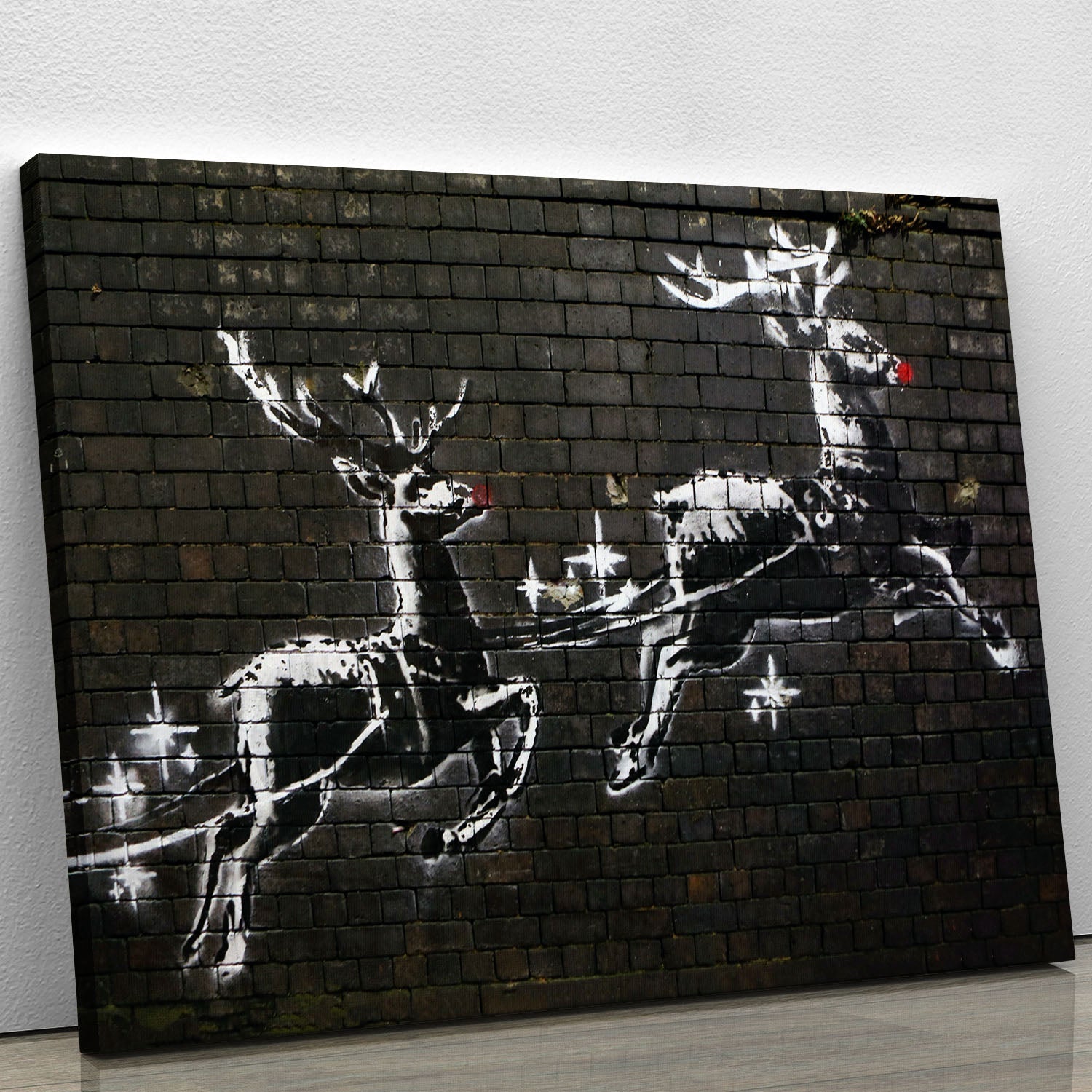 Banksy Christmas canvas print featuring iconic street art style with festive elements, perfect for home decor.