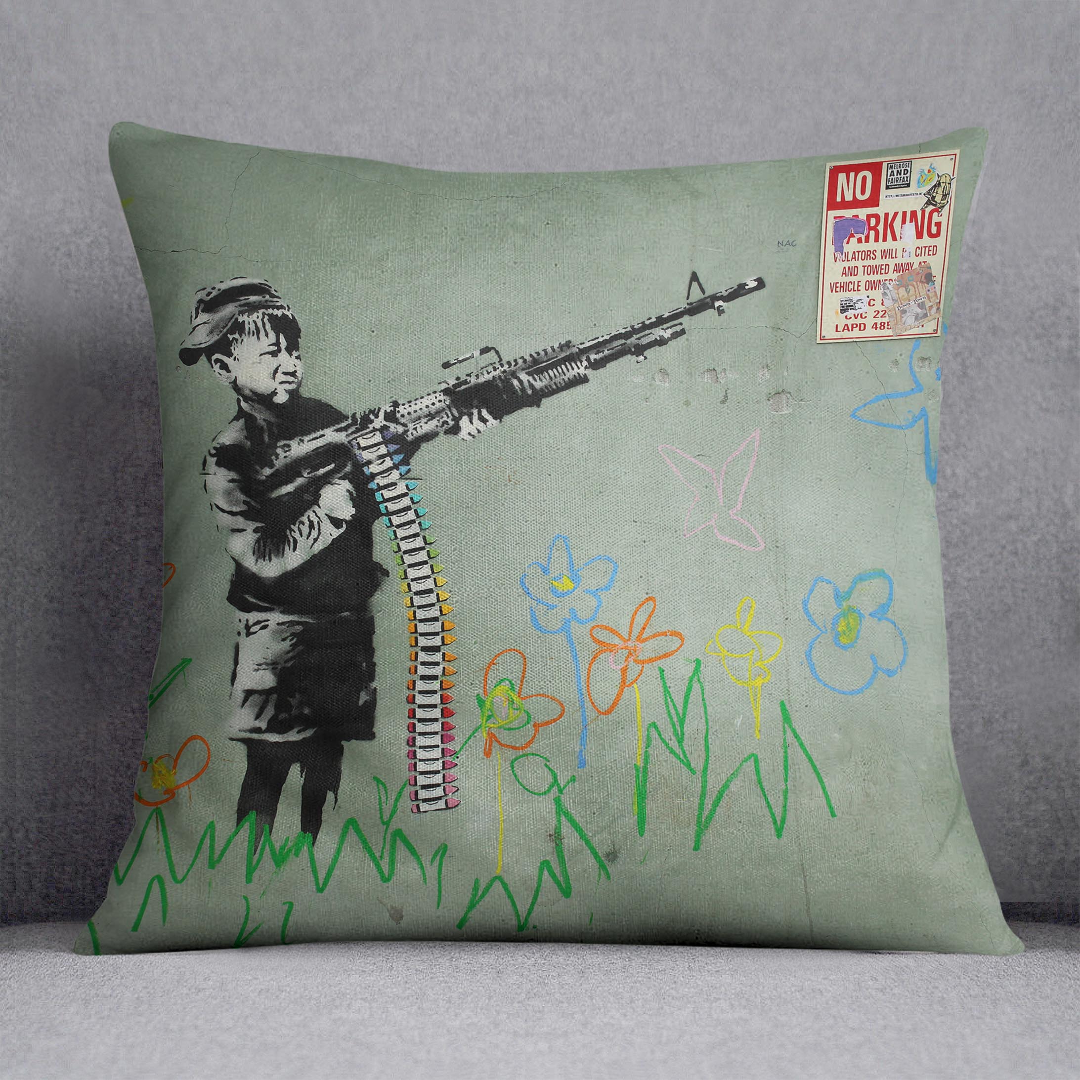 Banksy Crayon Child Soldier Cushion featuring vibrant colors and abstract design on luxurious vegan faux suede.