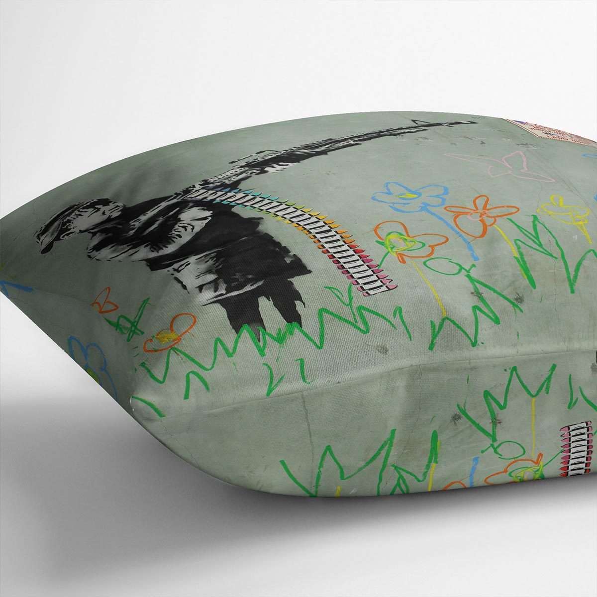 Banksy Crayon Child Soldier Cushion featuring vibrant colors and abstract design on luxurious vegan faux suede.
