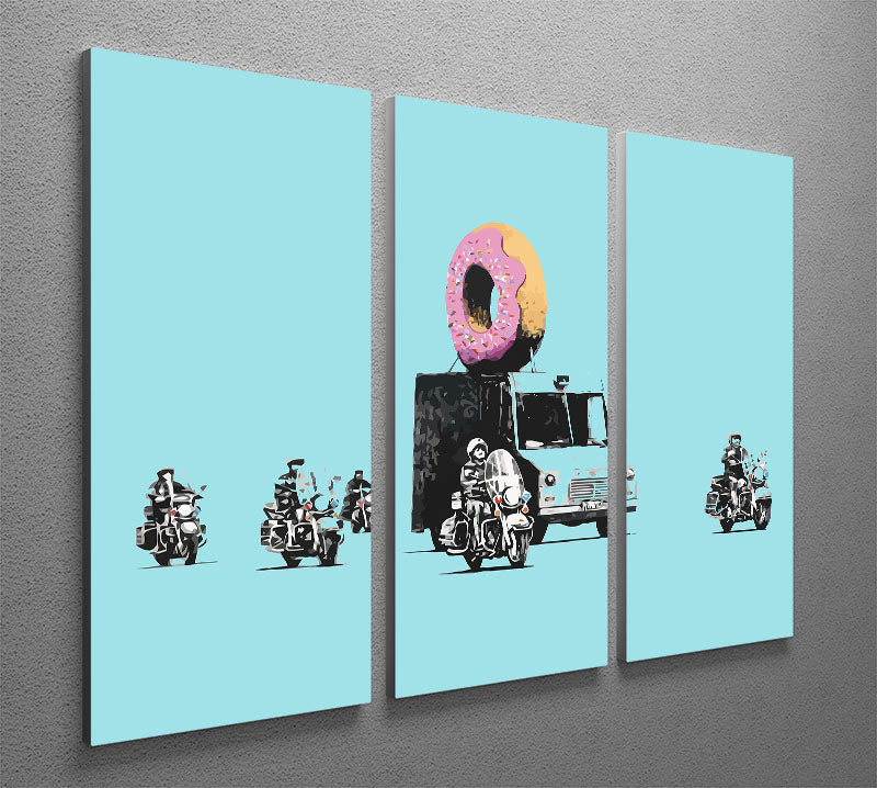 Banksy Doughnut Police Light Blue 3 Split Panel Canvas Print showcasing vibrant colors and modern art style.