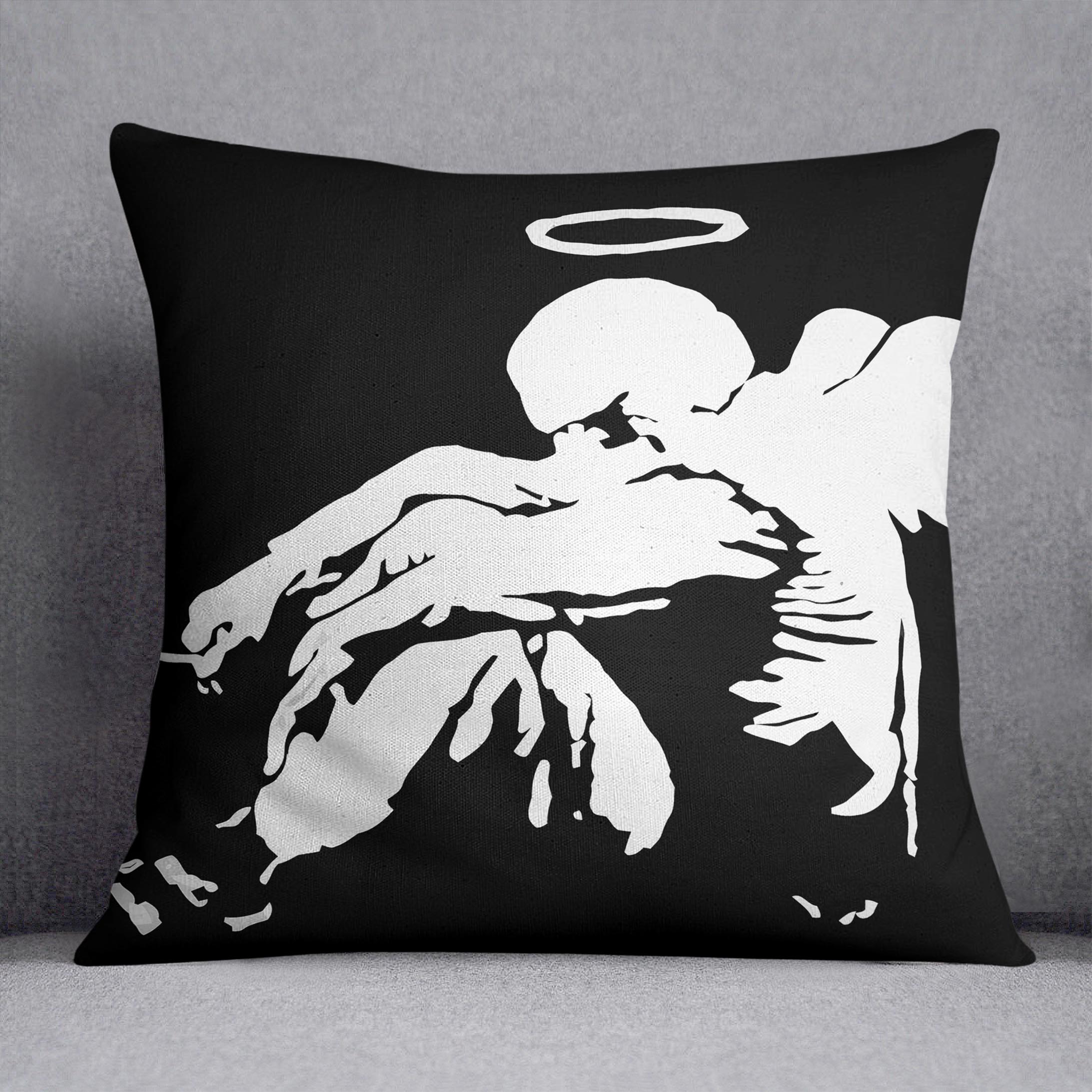 Banksy Fallen Angel Cushion featuring vibrant abstract design on luxurious vegan faux suede.