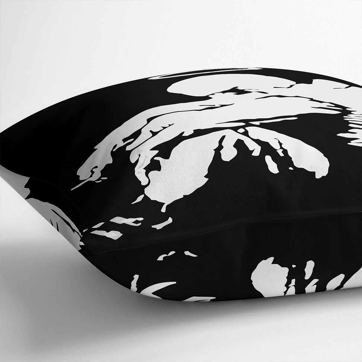 Banksy Fallen Angel Cushion featuring vibrant abstract design on luxurious vegan faux suede.